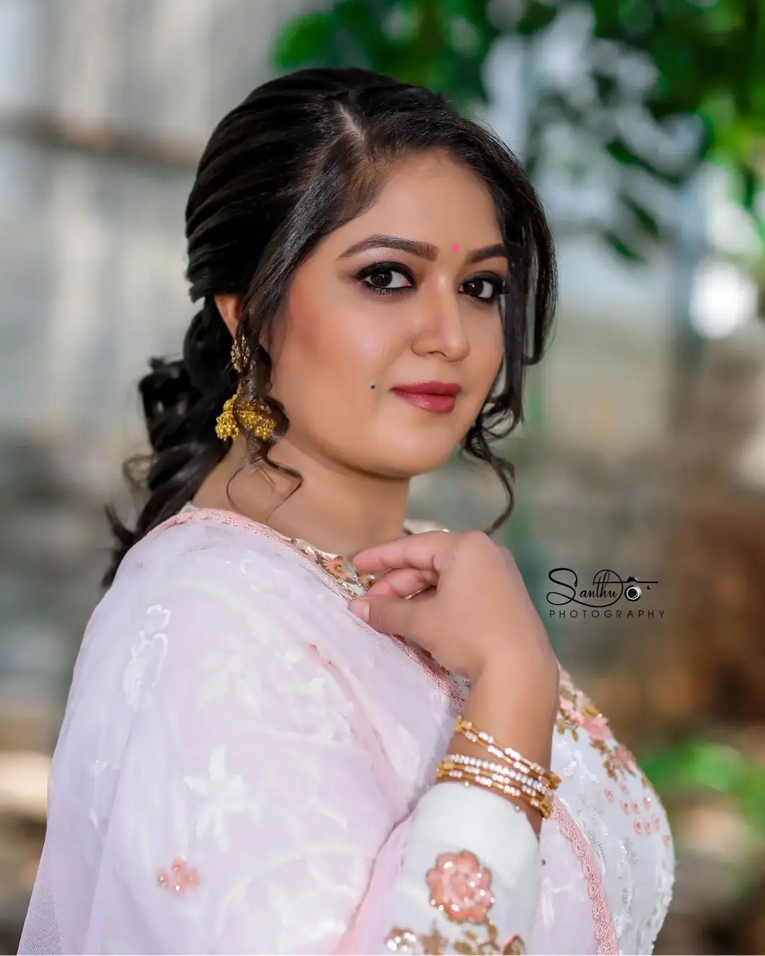 Meghana Raj Wearing Beautiful Earring White Designer Gown